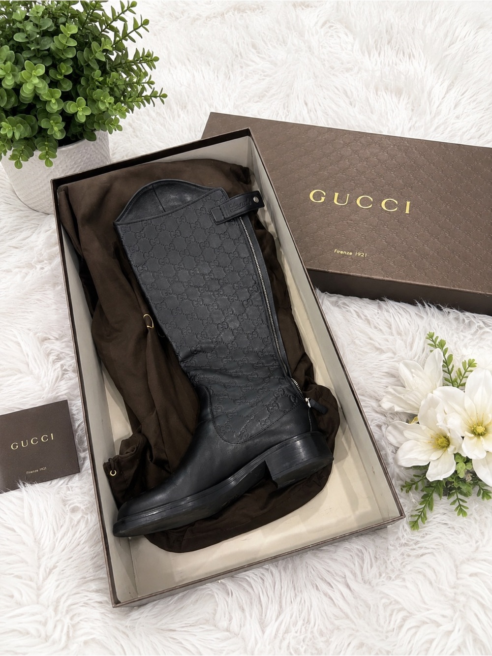 Tall Gucci black boot